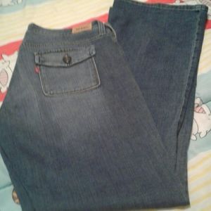 Levi's 545,Boot Cut, Medium Wash, Denim Jeans with Rear Button Flap-Over Pockets